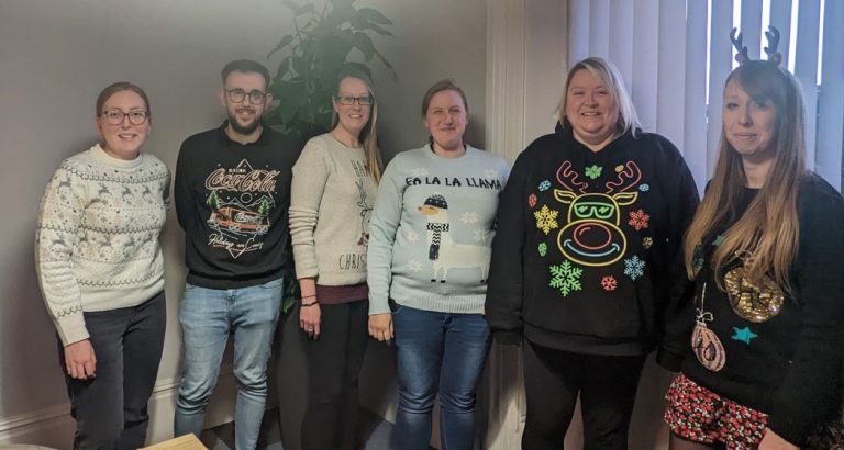 IT firm completes year of fundraising by donning festive knits for Christmas Jumper Day